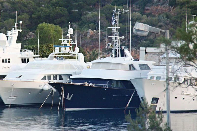 several boats in a harbor aboard AETEA Yacht for Sale