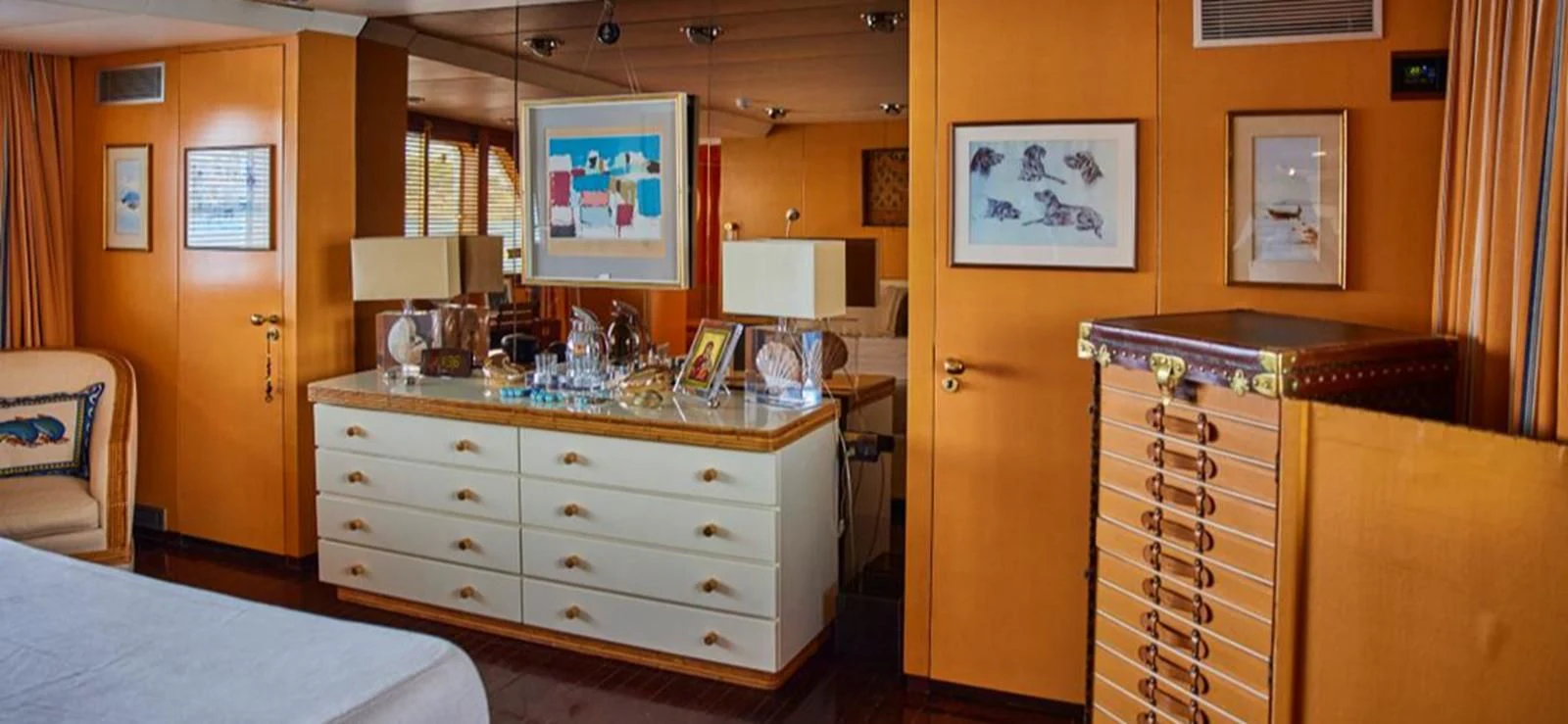 a room with a bed and a desk aboard AETEA Yacht for Sale