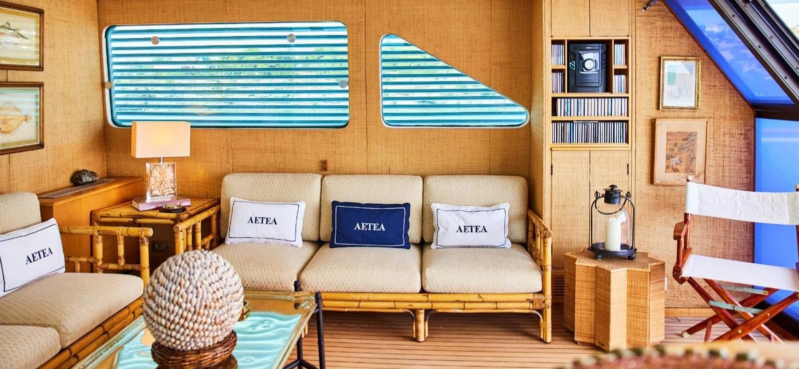 a living room with a couch and a table aboard AETEA Yacht for Sale