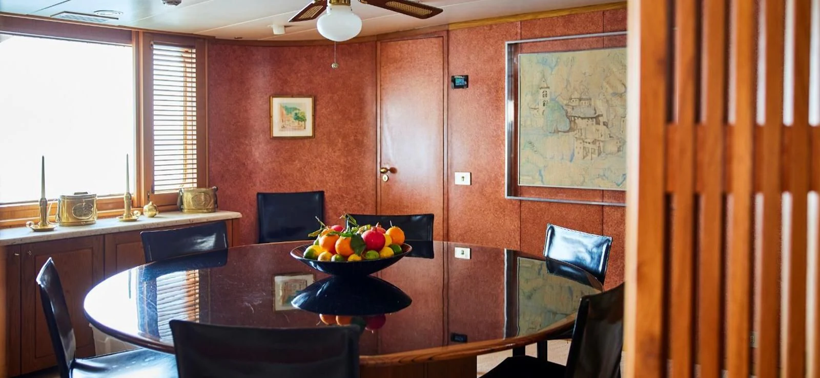 a table with fruit on it aboard AETEA Yacht for Sale