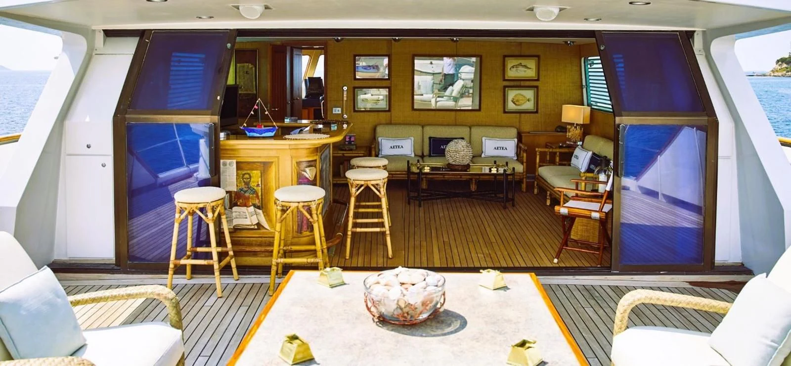 a room with a couch and chairs aboard AETEA Yacht for Sale