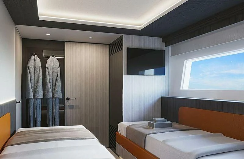 a room with a bed and a window aboard UNA CAPRA Yacht for Sale