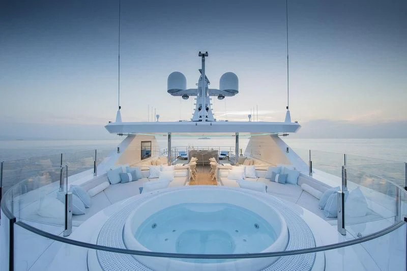 a large white ship with a satellite dish on it aboard RASHA Yacht for Sale