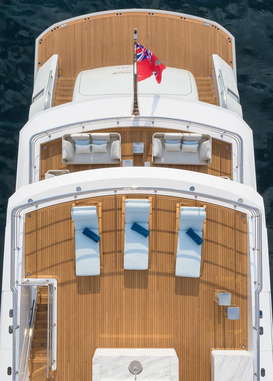 a wooden structure with a flag on it aboard RASHA Yacht for Sale