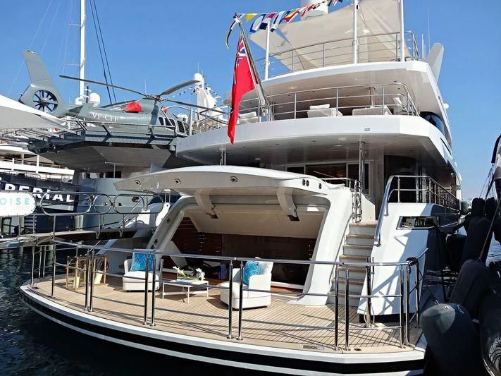 a boat docked at a pier aboard RASHA Yacht for Sale