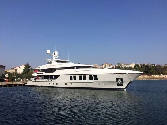 a white yacht on the water aboard RASHA Yacht for Sale