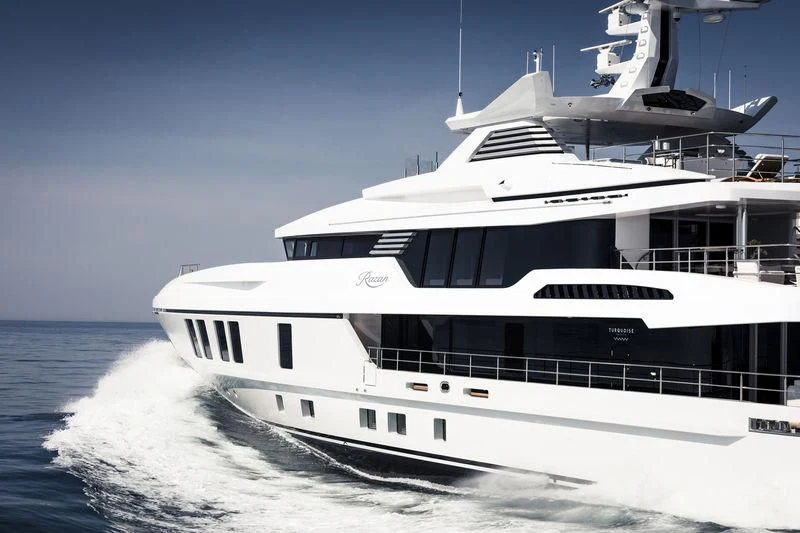 a white yacht on the water aboard RASHA Yacht for Sale