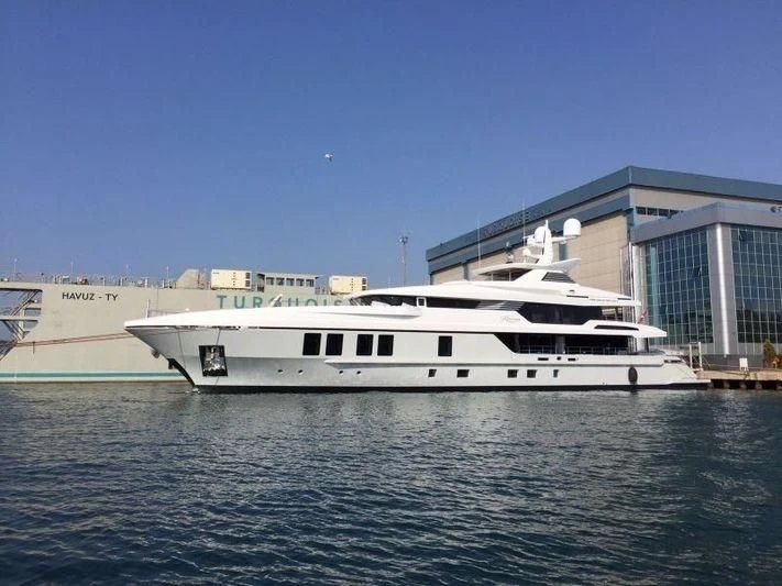 a white boat in the water aboard RASHA Yacht for Sale