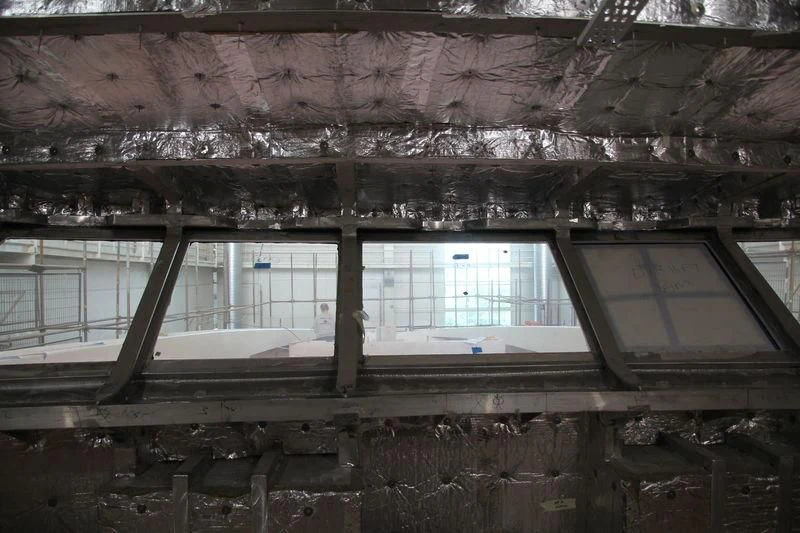 a room with a window and a broken roof aboard RASHA Yacht for Sale