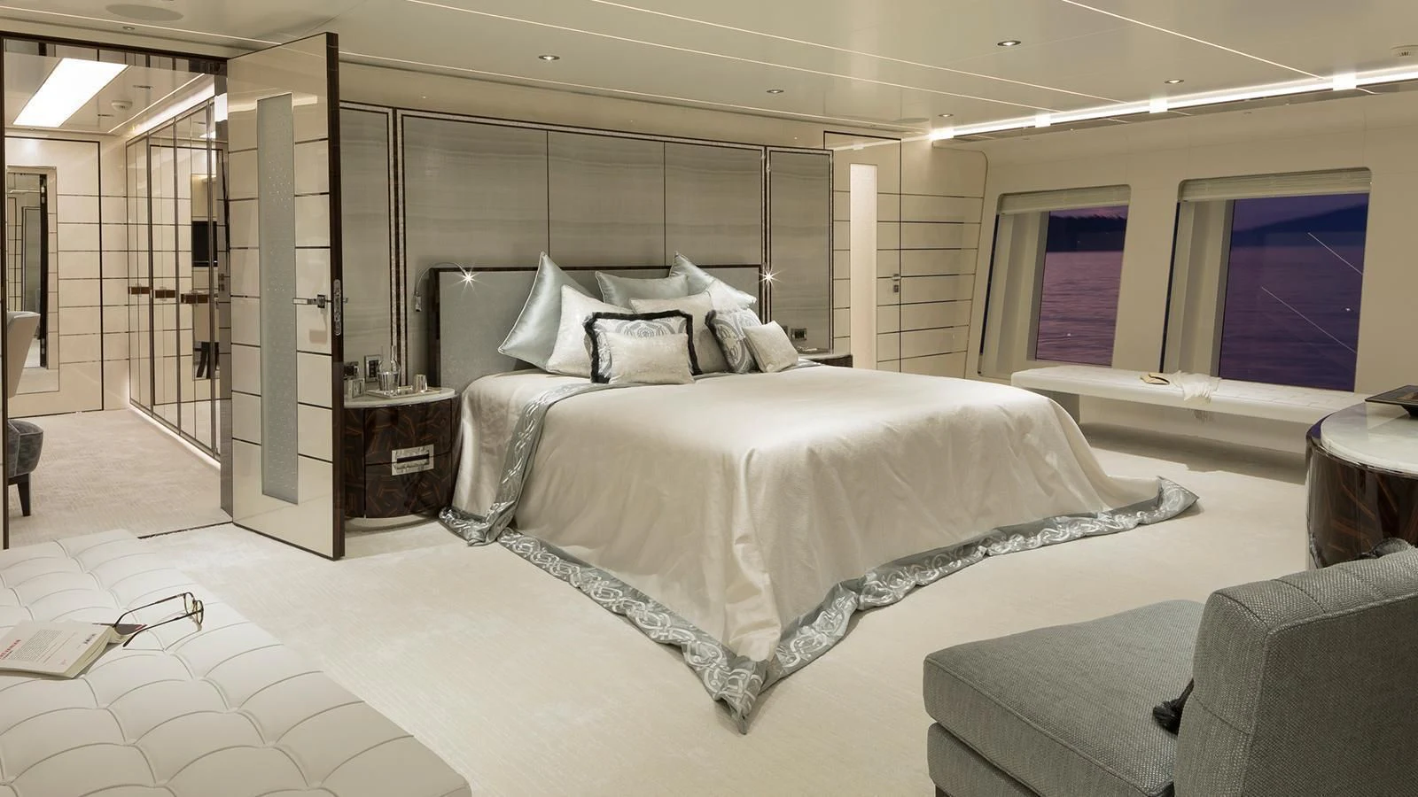 a large bed in a room aboard RASHA Yacht for Sale