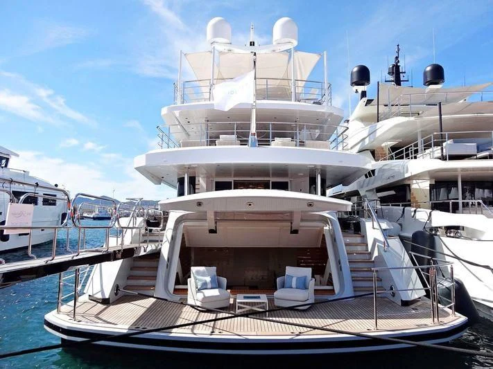 a large white boat aboard RASHA Yacht for Sale
