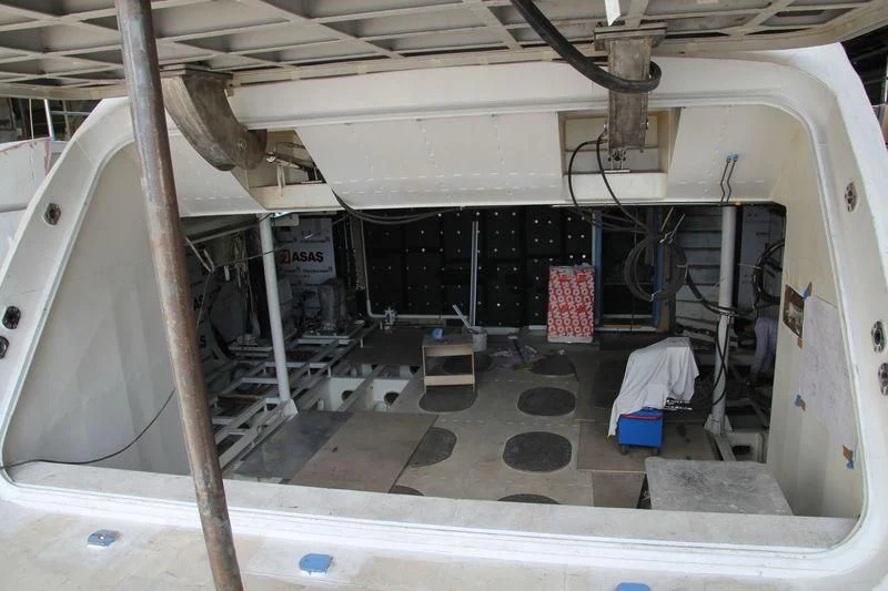 a large white machine aboard RASHA Yacht for Sale