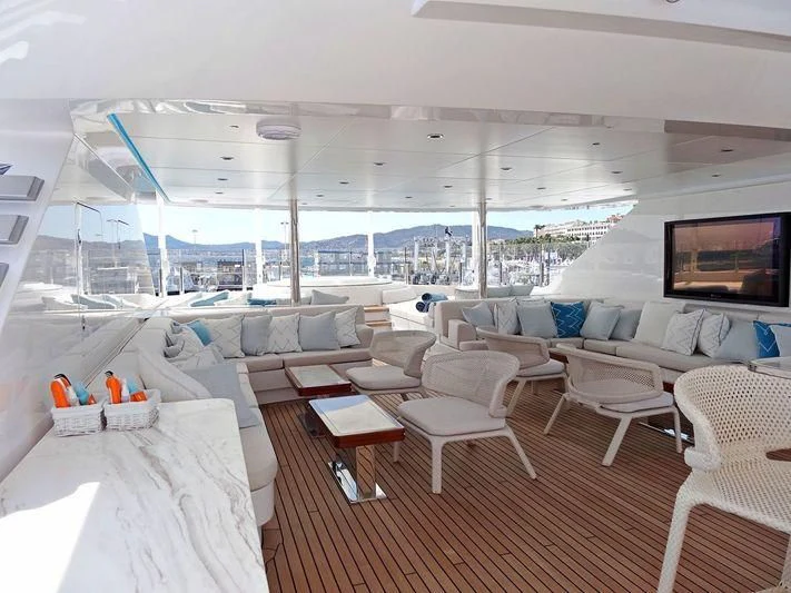 a room with a large window aboard RASHA Yacht for Sale