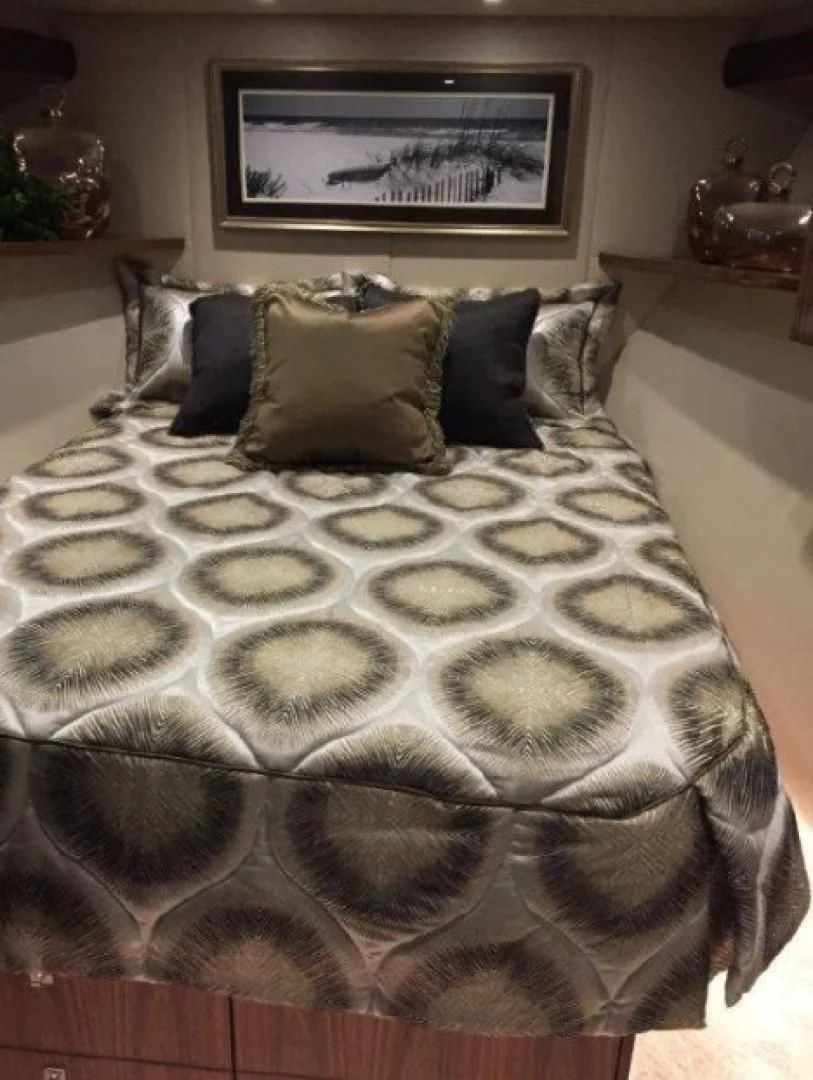 a bed with pillows aboard GALATI  TRADE Yacht for Sale
