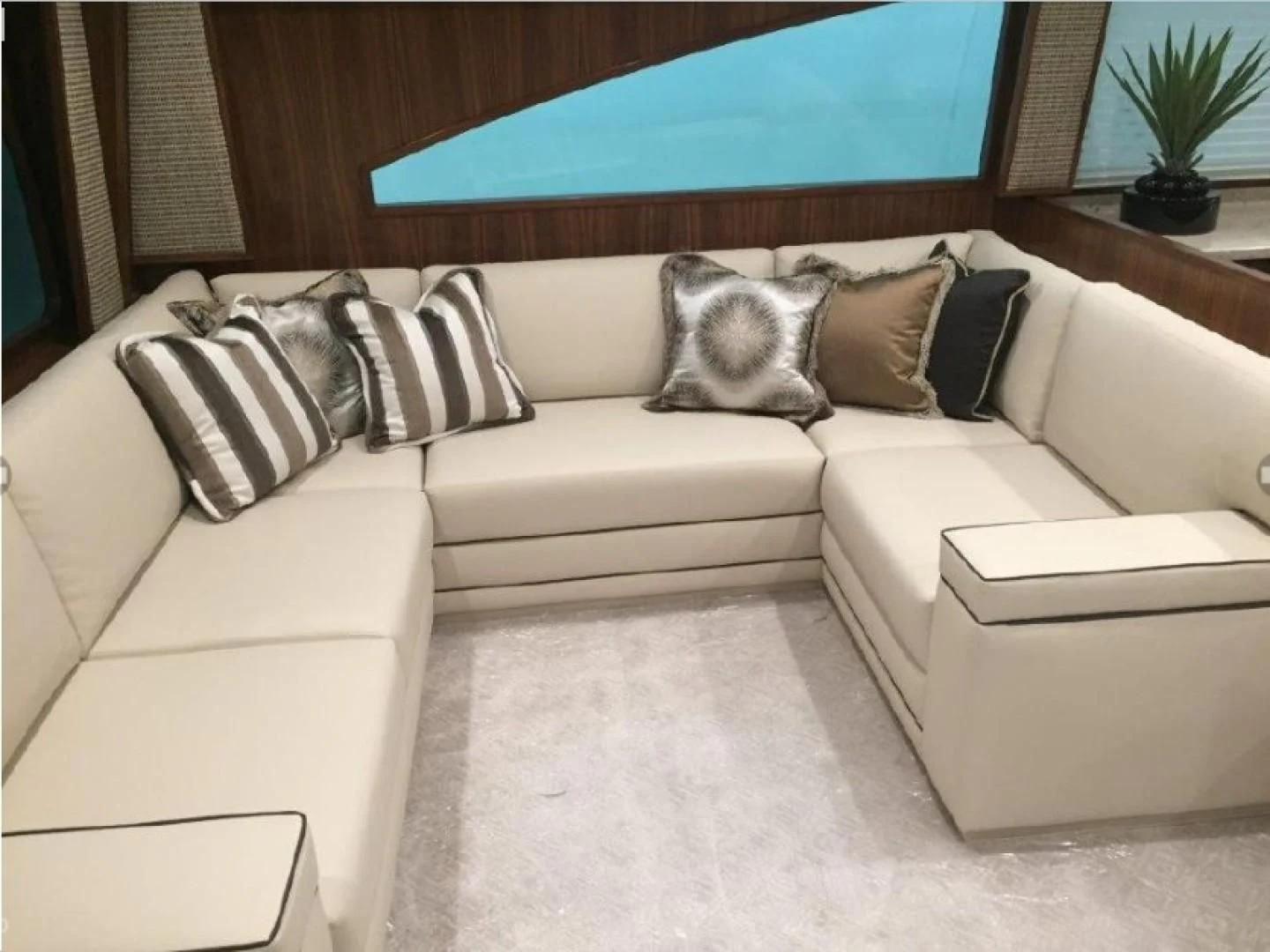 a couch with pillows aboard GALATI  TRADE Yacht for Sale