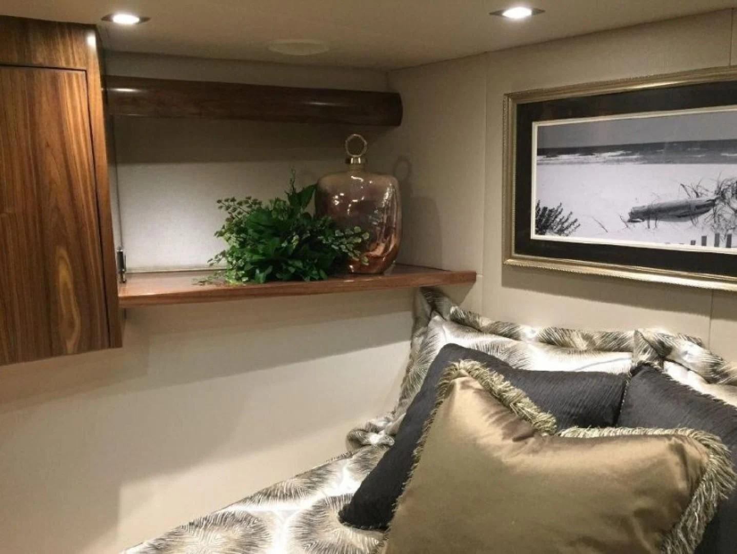 a living room with a large mirror aboard GALATI  TRADE Yacht for Sale