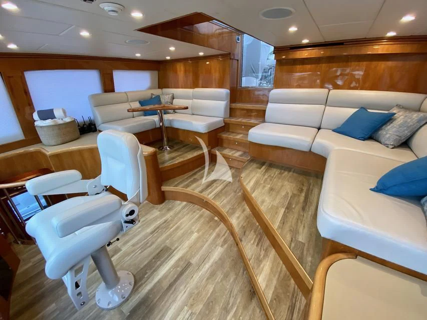 a room with a couch and a table aboard BRANDI WINE Yacht for Charter