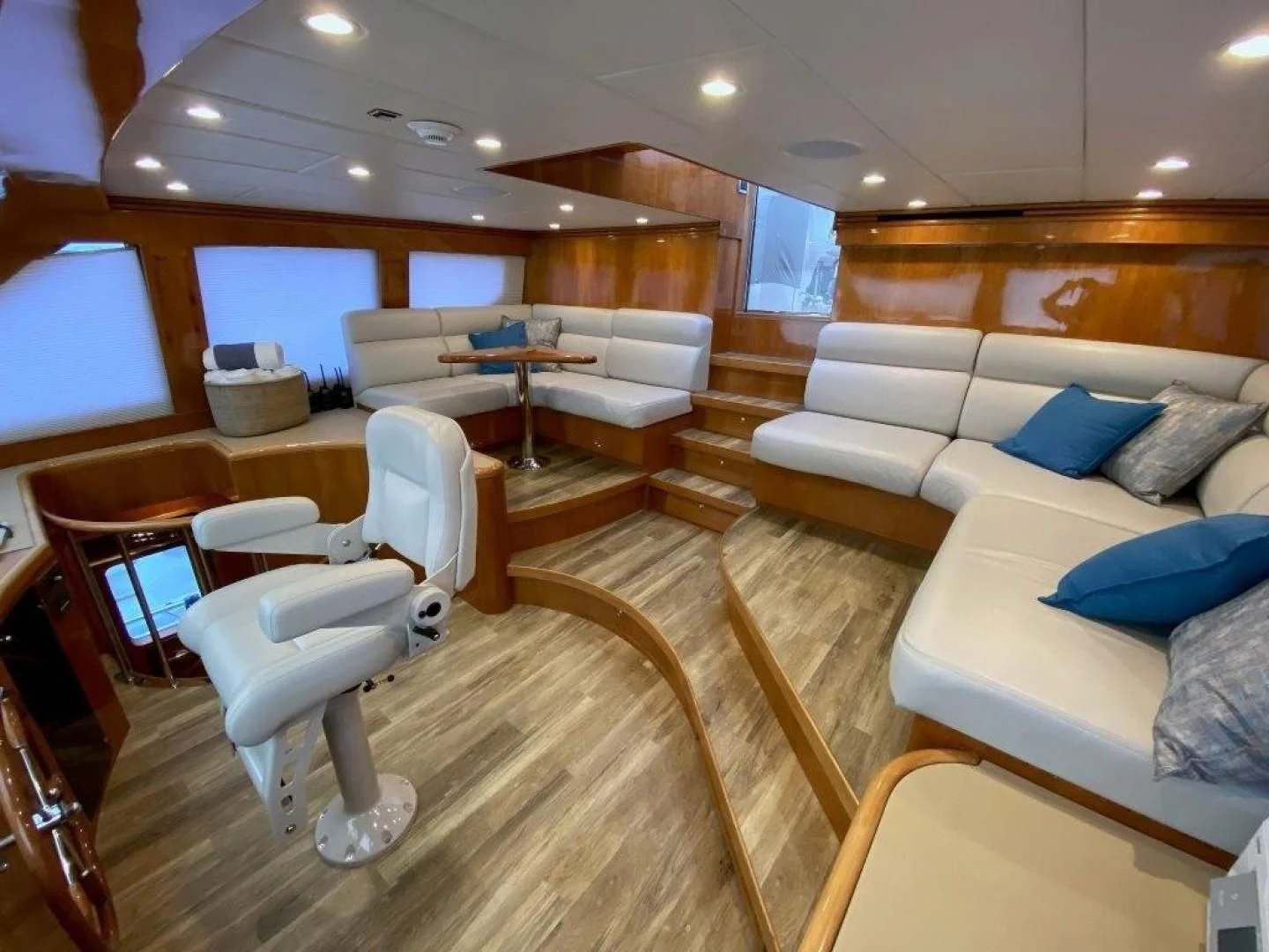 a living room with a couch and a table aboard BRANDI WINE Yacht for Charter