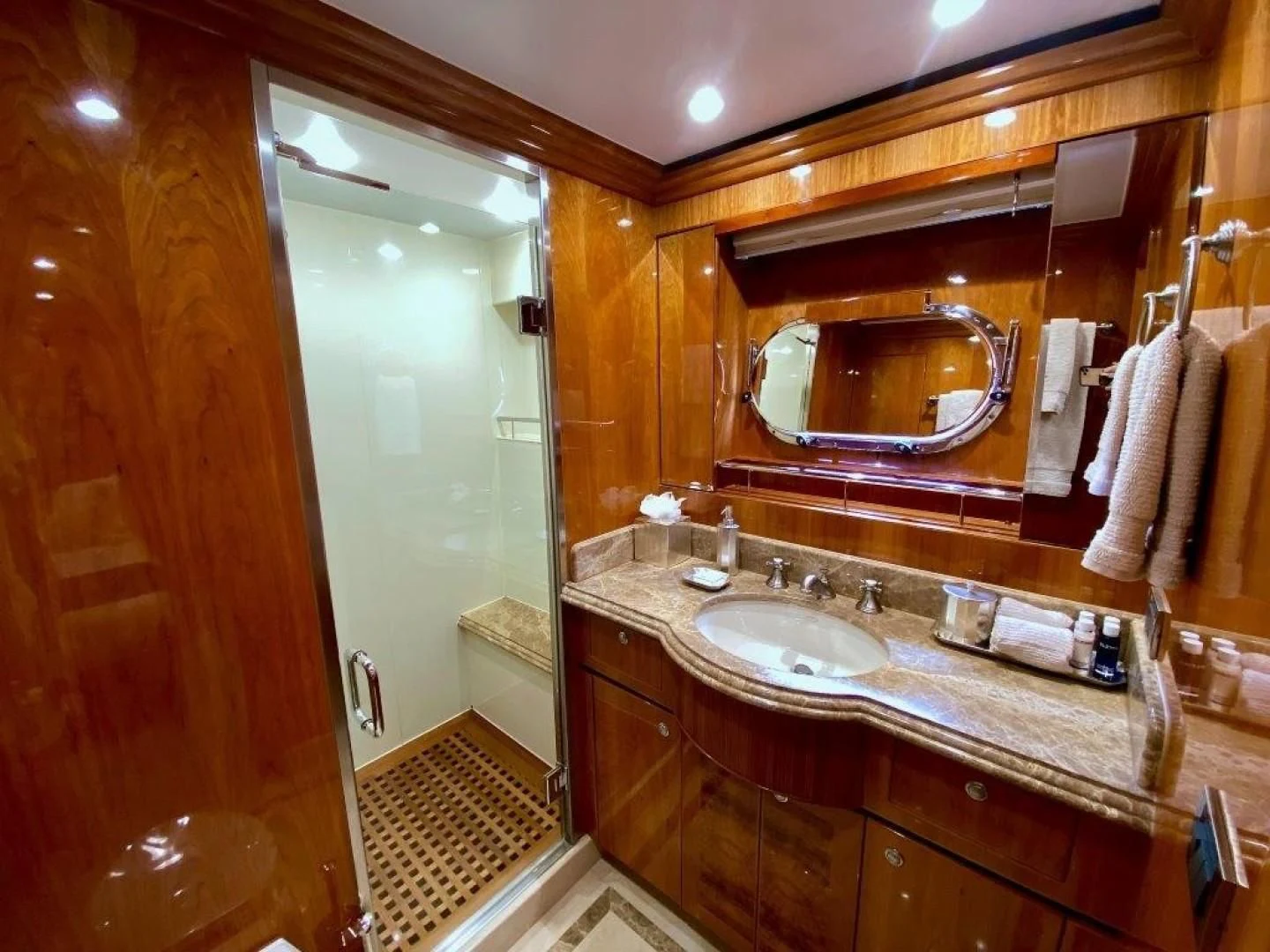a bathroom with a large mirror aboard BRANDI WINE Yacht for Charter