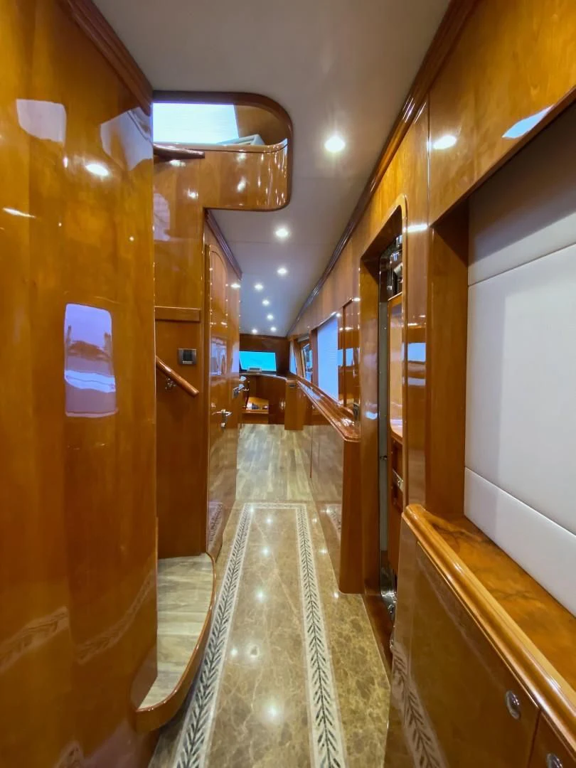 a hallway with a glass door aboard BRANDI WINE Yacht for Charter