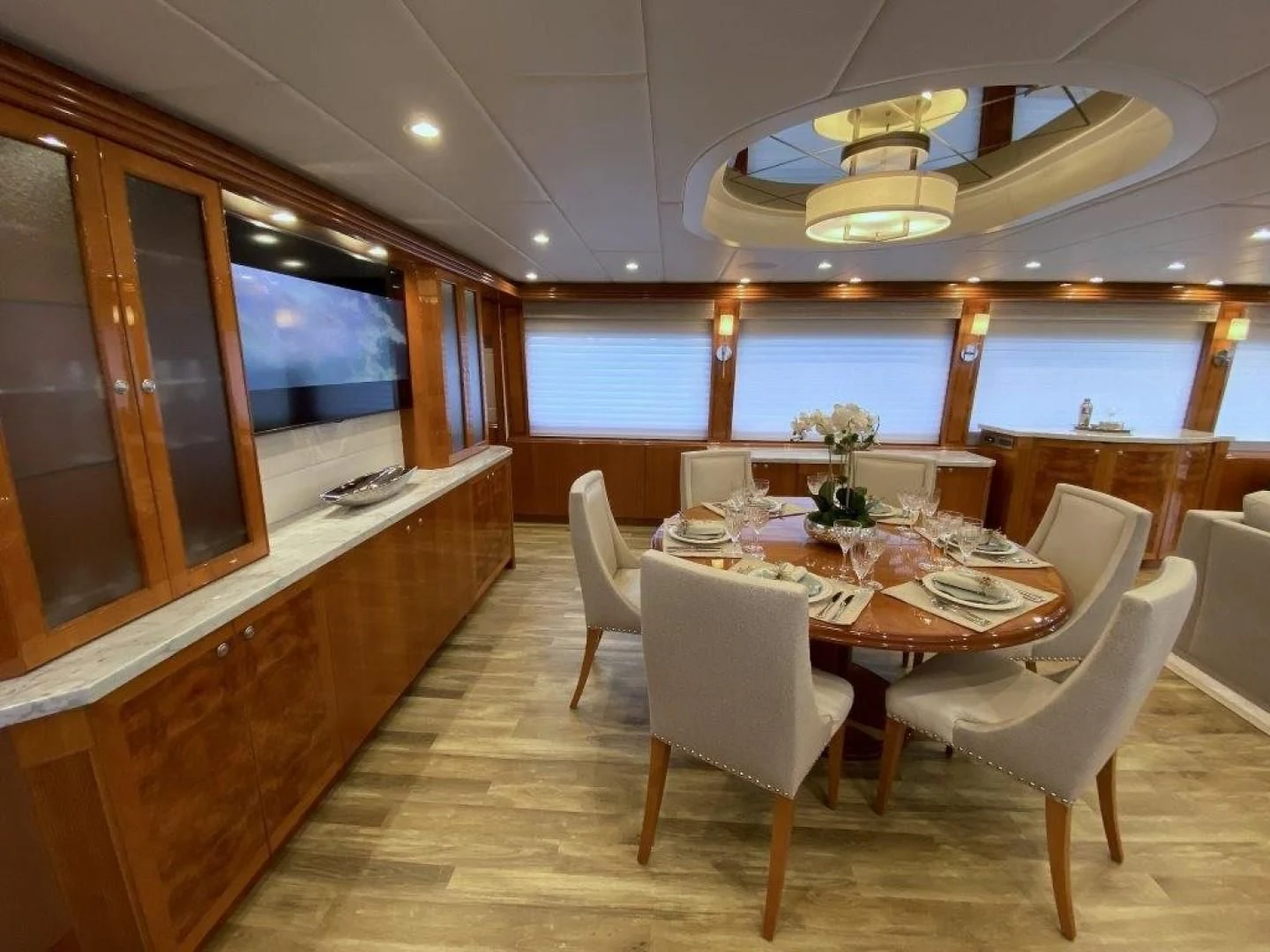 a room with a table and chairs aboard BRANDI WINE Yacht for Charter