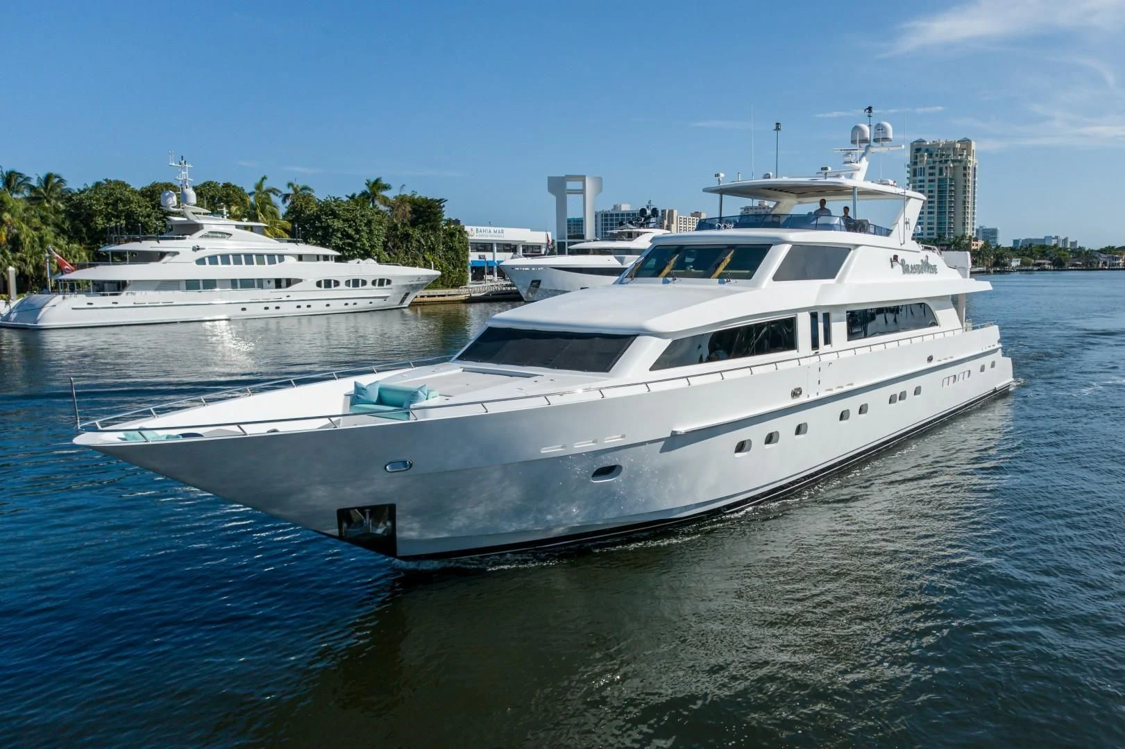 a couple of large white yachts in the water aboard BRANDI WINE Yacht for Charter