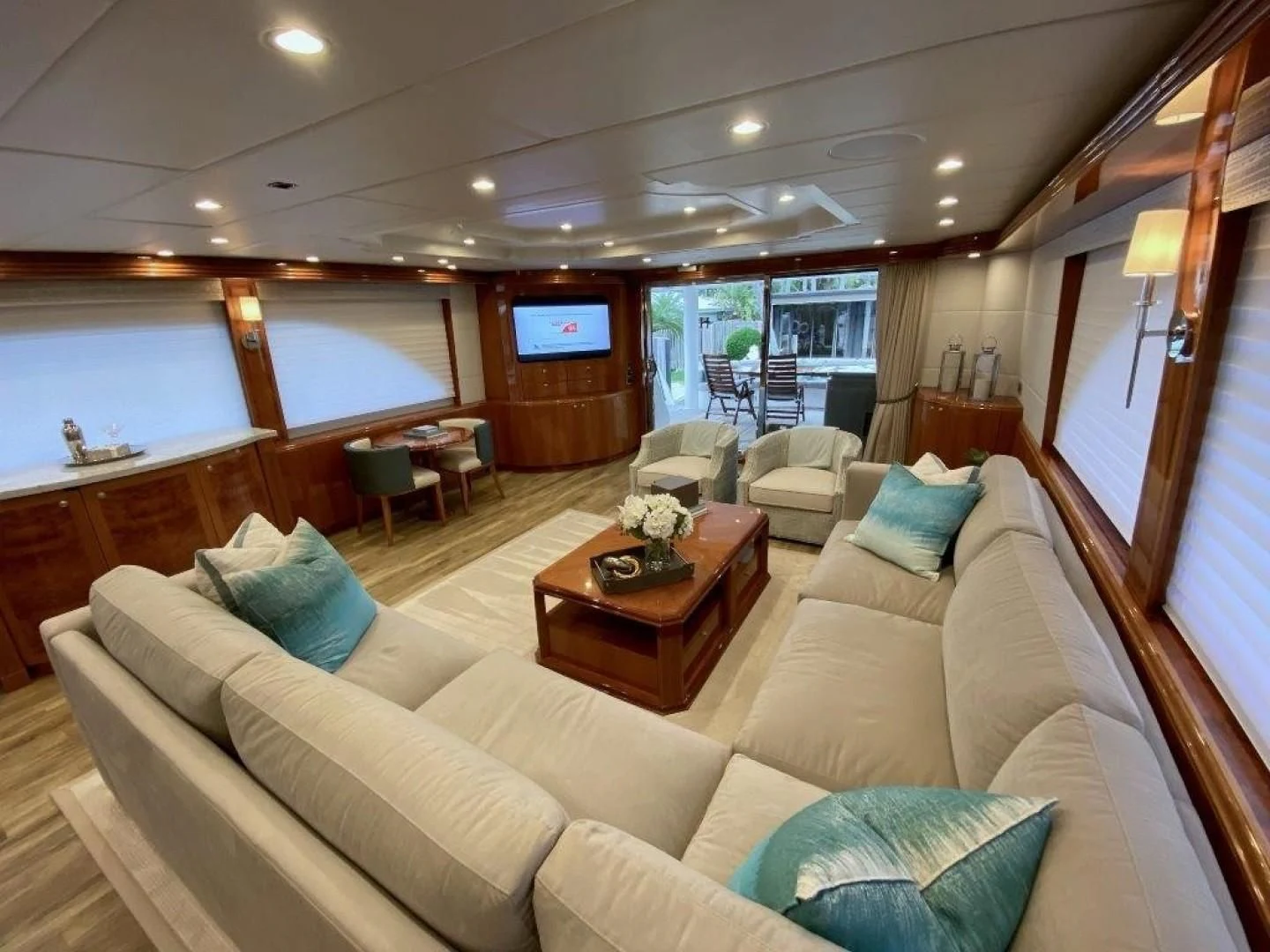 a living room with a large window aboard BRANDI WINE Yacht for Charter