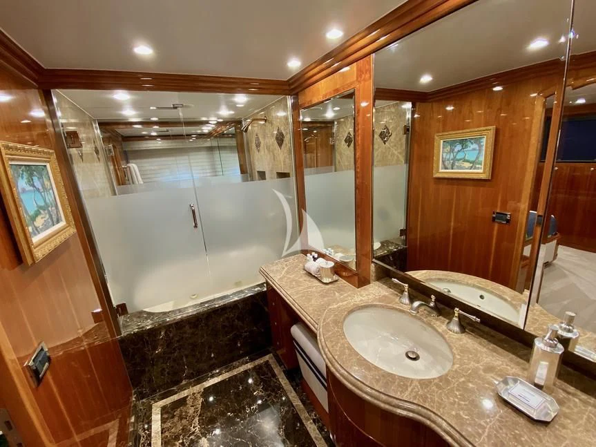 a bathroom with a large marble counter aboard BRANDI WINE Yacht for Charter