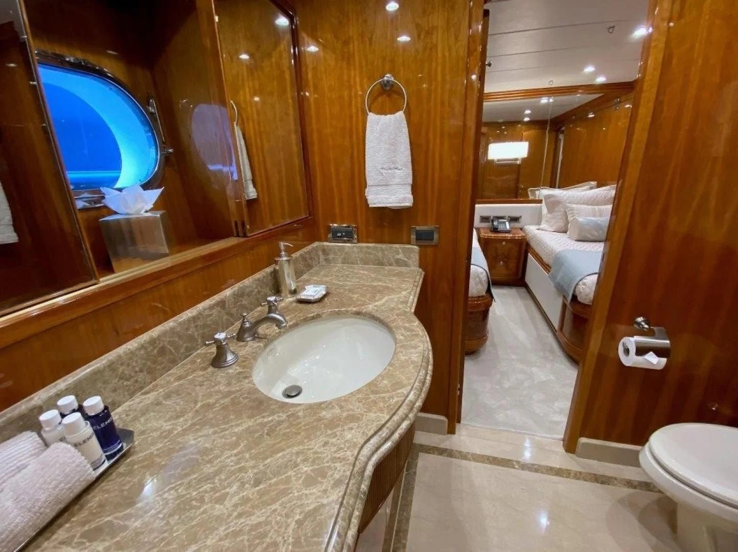 a bathroom with a large marble countertop aboard BRANDI WINE Yacht for Charter