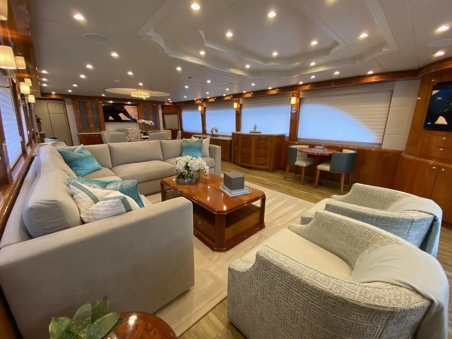 a living room with a large window aboard BRANDI WINE Yacht for Charter