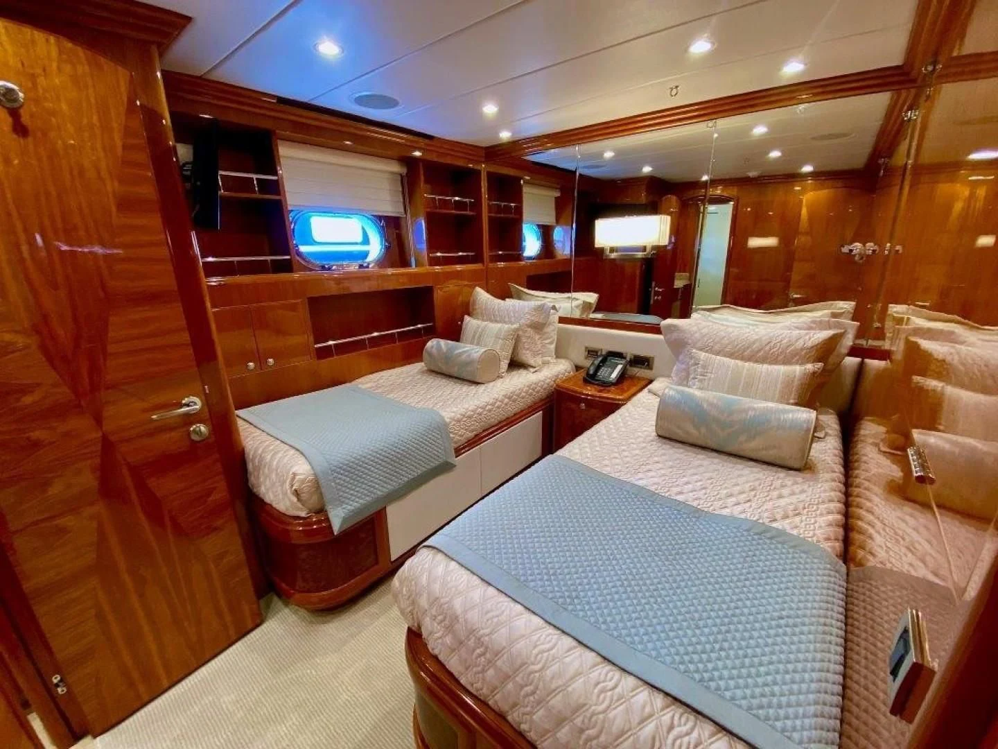 a room with a bed and a couch aboard BRANDI WINE Yacht for Charter