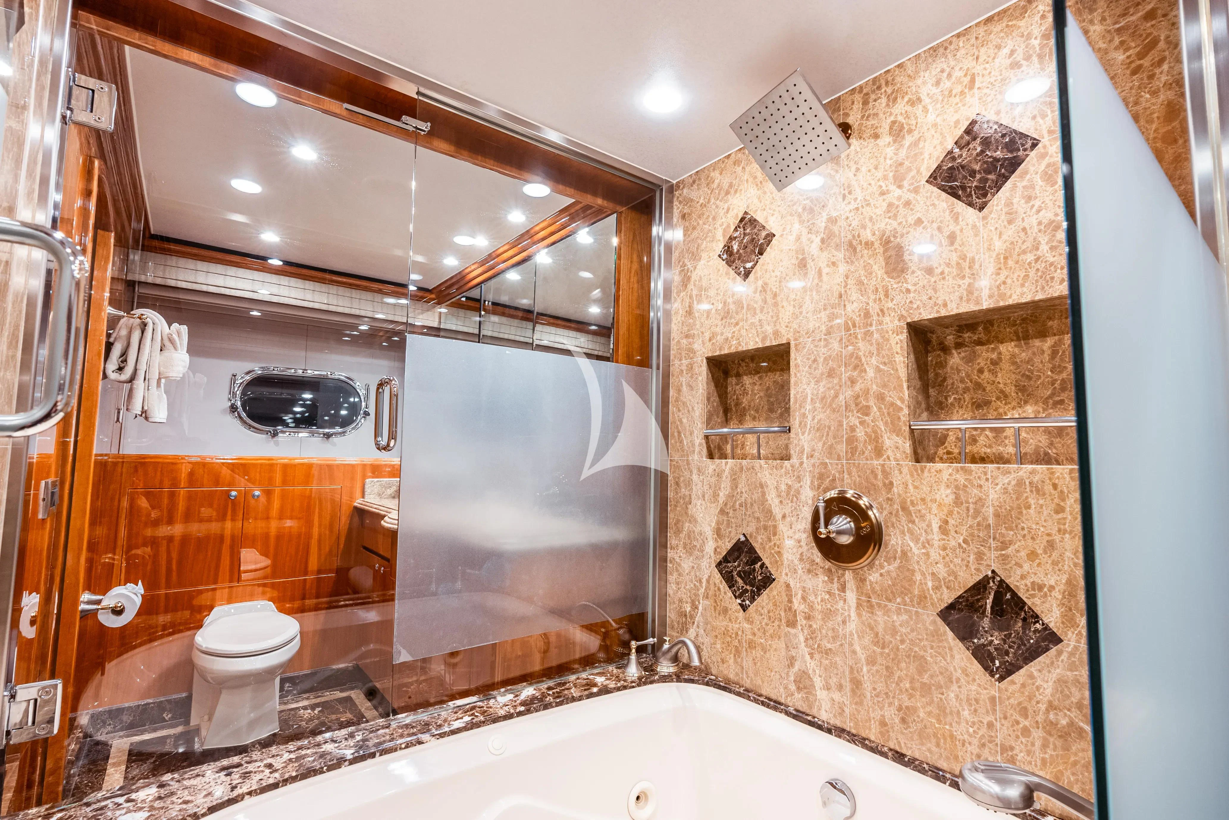 a bathroom with a large mirror aboard BRANDI WINE Yacht for Charter