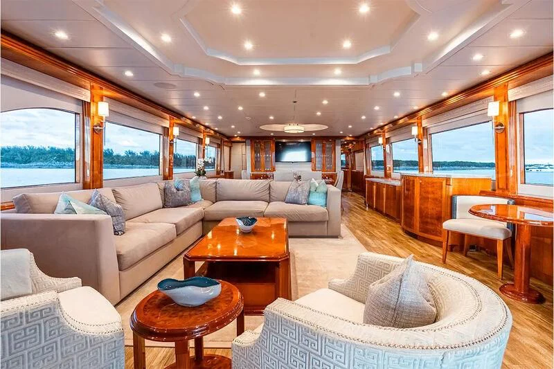 a living room with a large window aboard BRANDI WINE Yacht for Charter