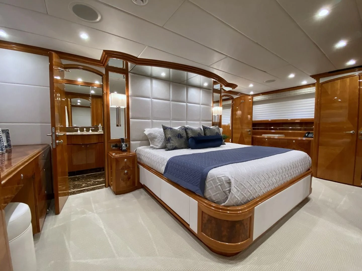 a large bedroom with a bed aboard BRANDI WINE Yacht for Charter