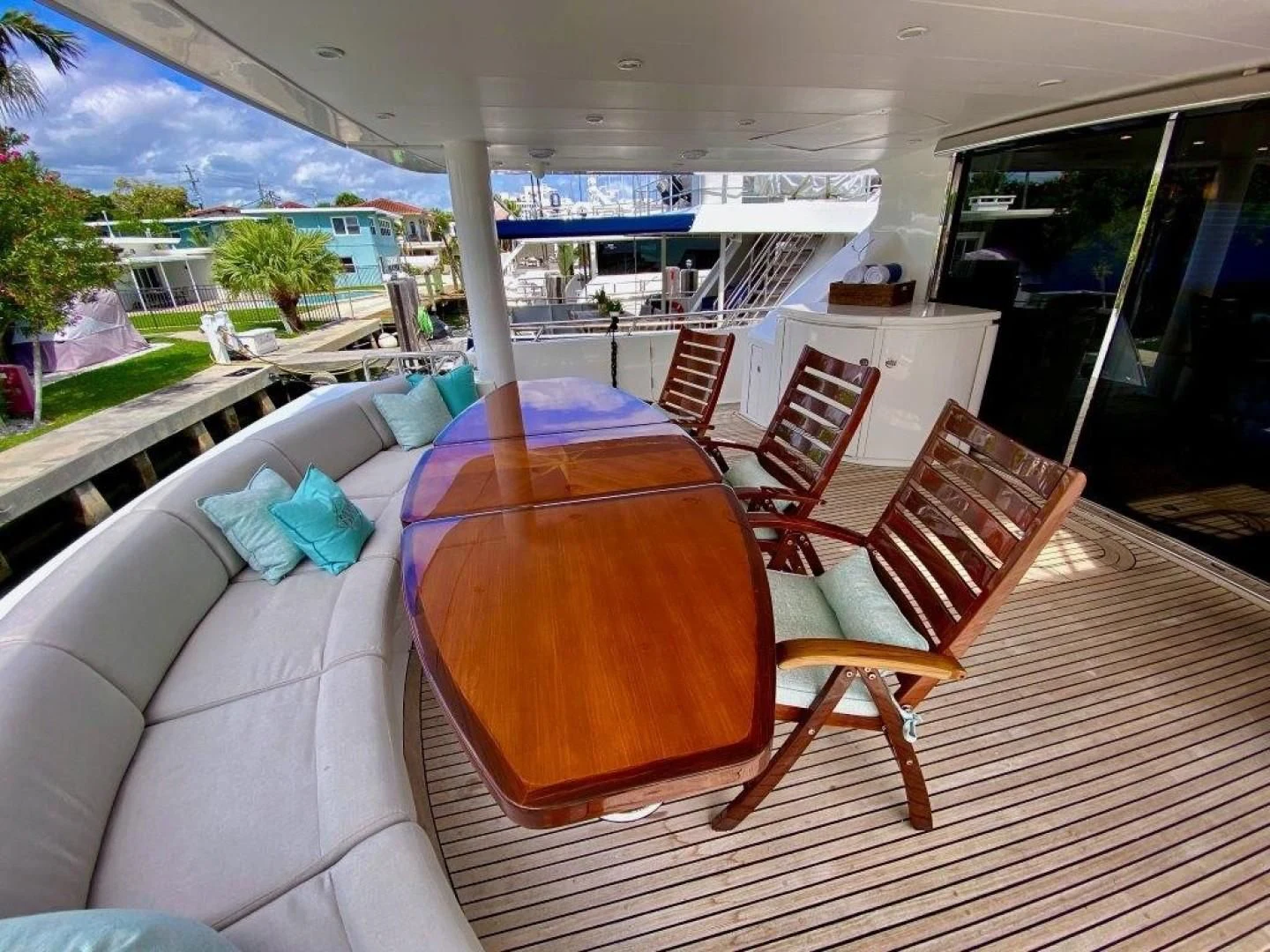 a large lounge area with a large patio and a pool aboard BRANDI WINE Yacht for Charter