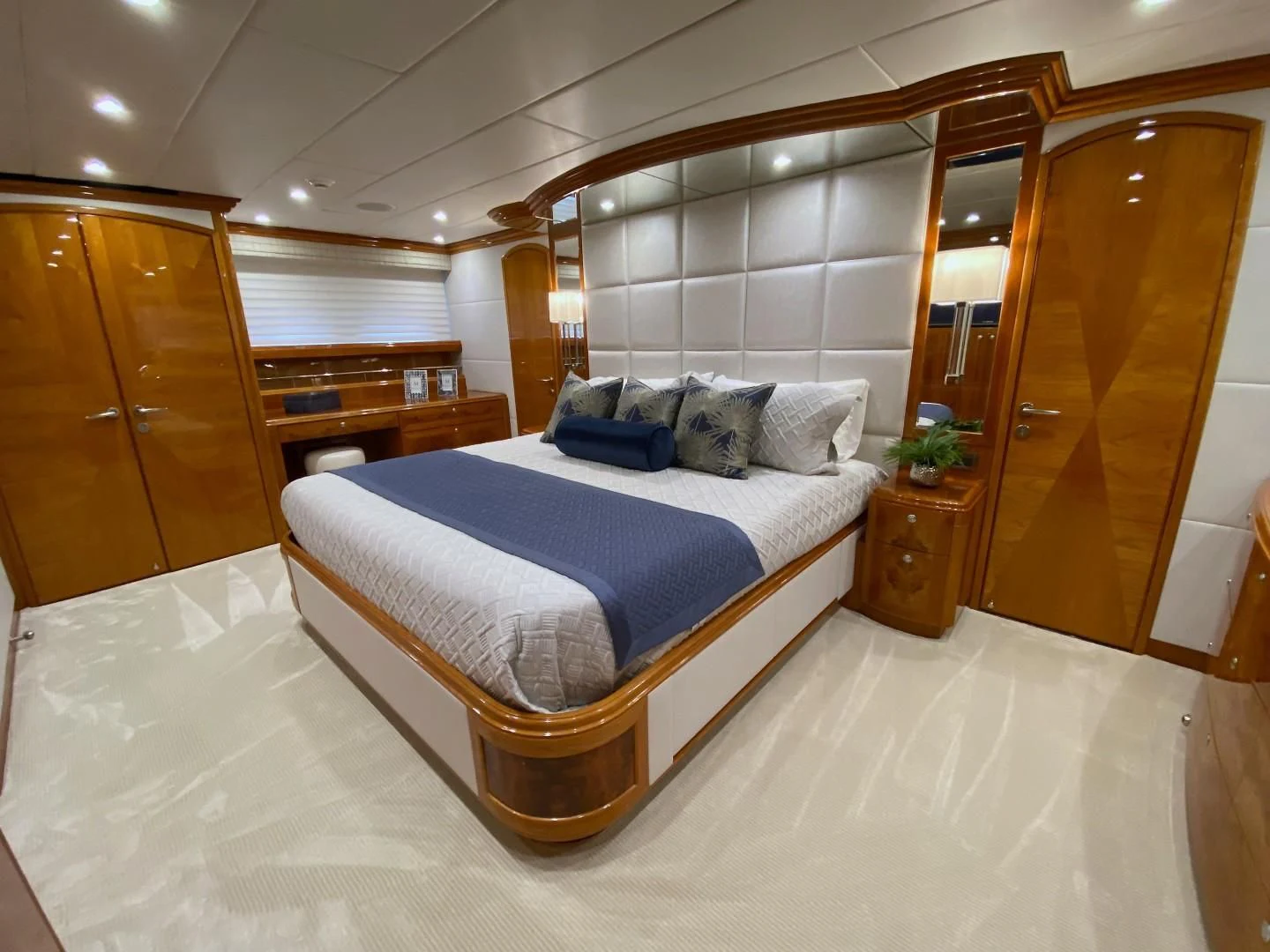 a large bedroom with a large bed aboard BRANDI WINE Yacht for Charter