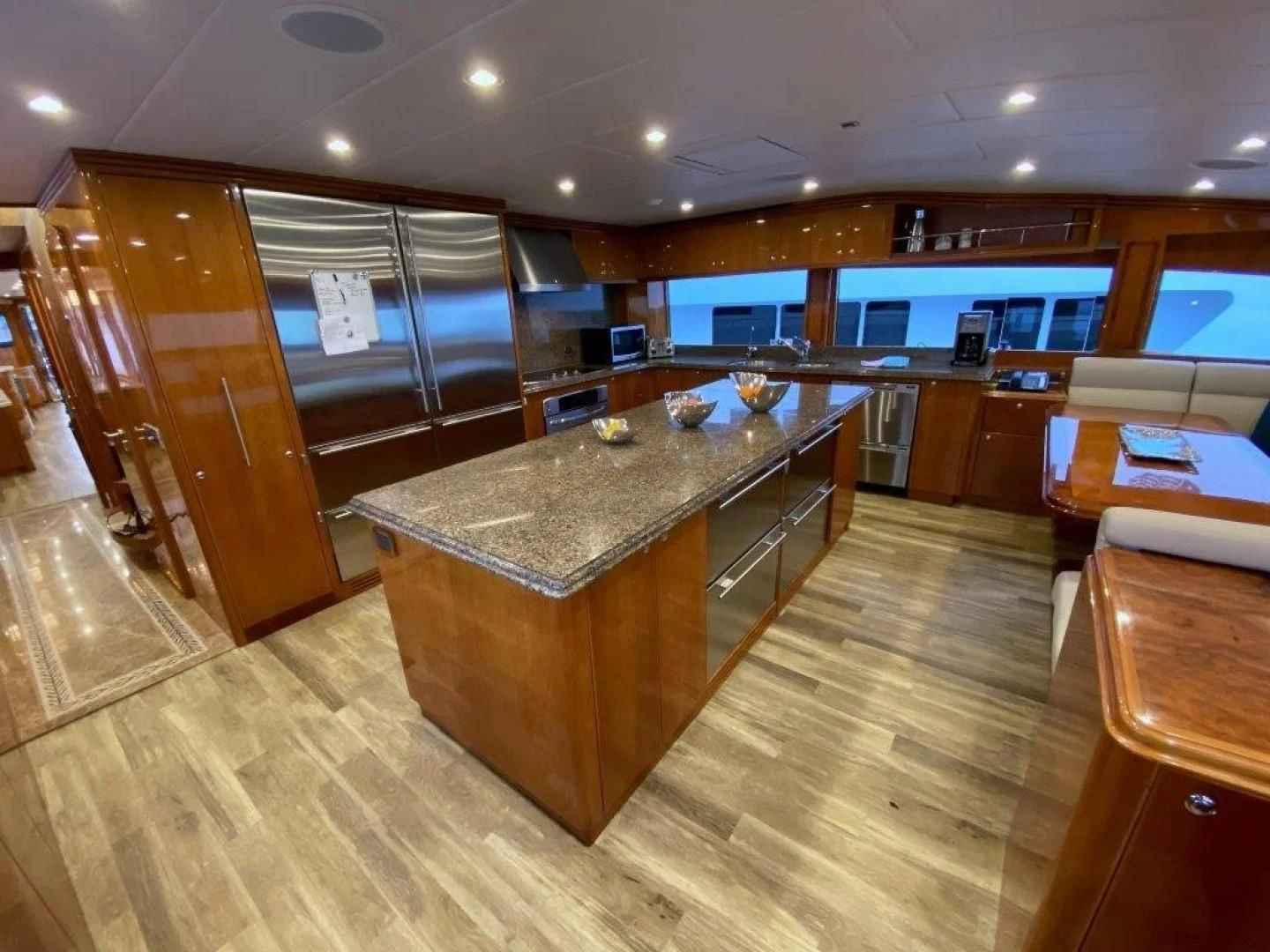 a large kitchen with a bar and bar aboard BRANDI WINE Yacht for Charter