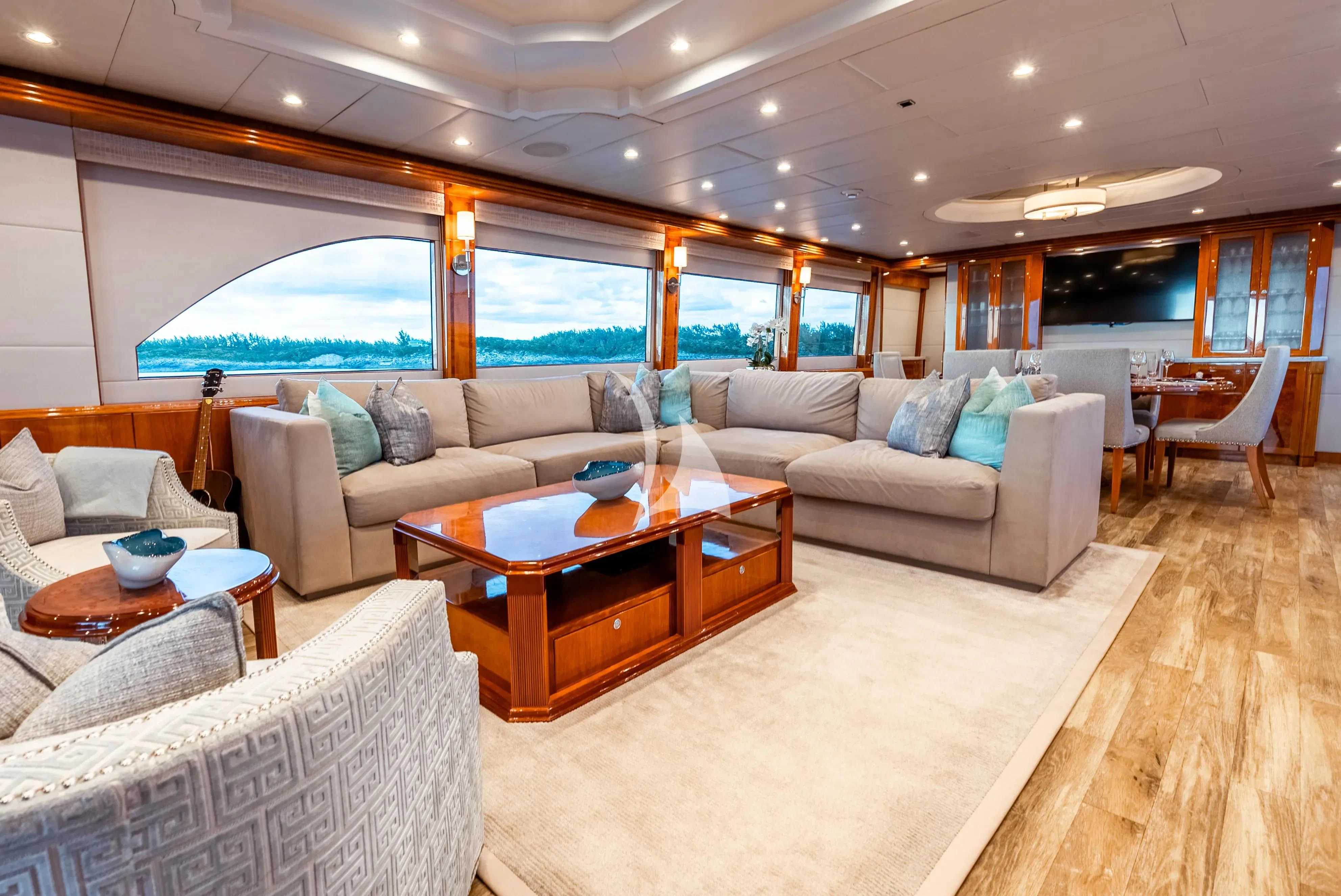 a living room with a large window aboard BRANDI WINE Yacht for Charter