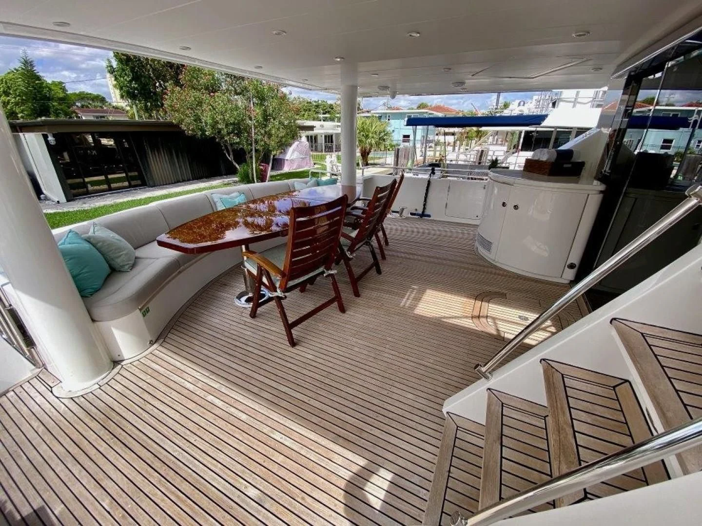 a large living room with a large deck and a pool aboard BRANDI WINE Yacht for Charter