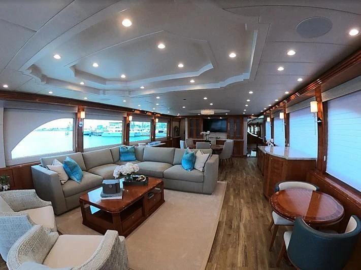 a living room with a large window aboard BRANDI WINE Yacht for Charter