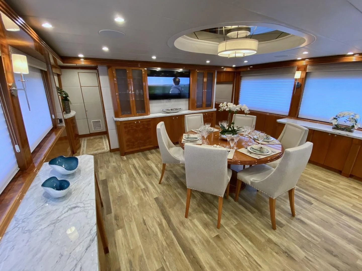 a dining room with a table and chairs aboard BRANDI WINE Yacht for Charter