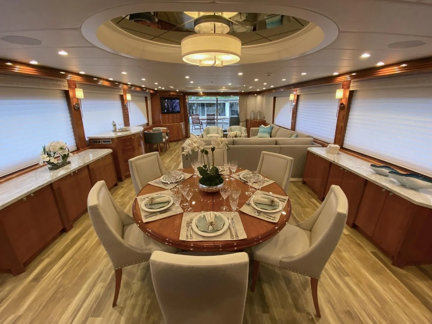 a dining room with a table and chairs aboard BRANDI WINE Yacht for Charter