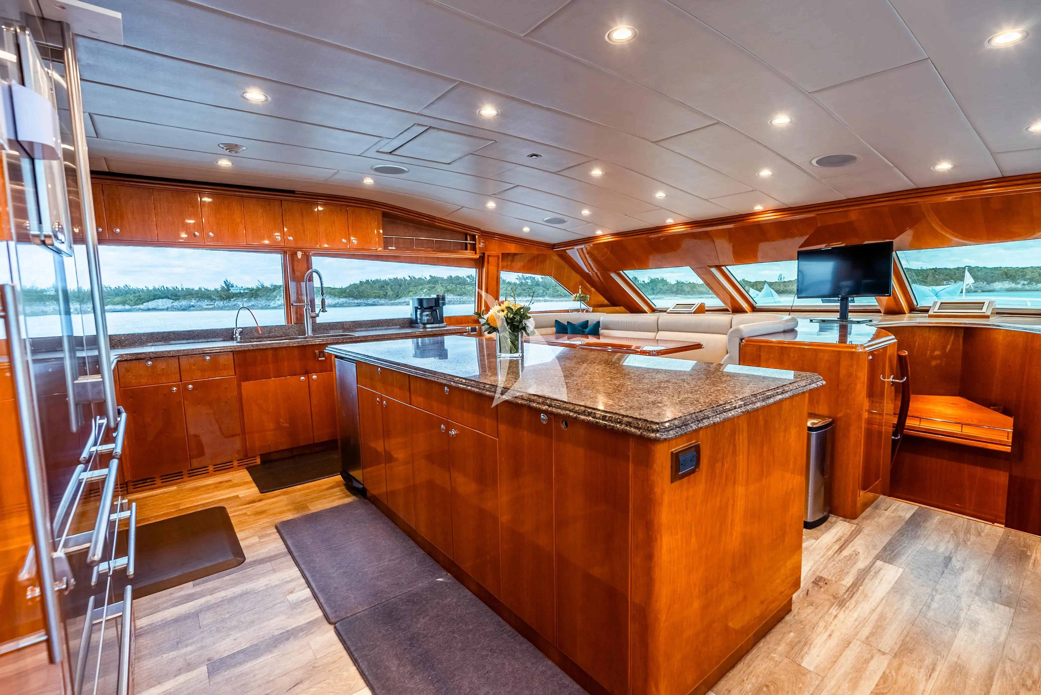 a large kitchen with a large island aboard BRANDI WINE Yacht for Charter