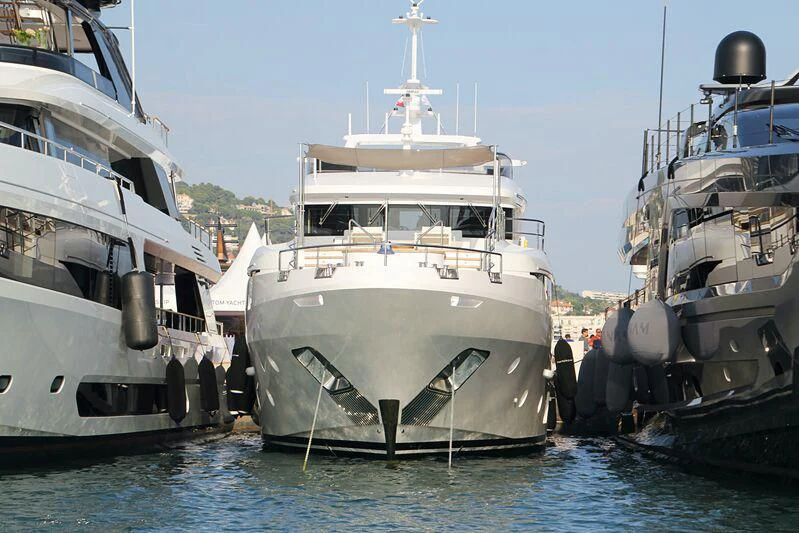 a large white boat sits in the water aboard PORTOVINO Yacht for Sale