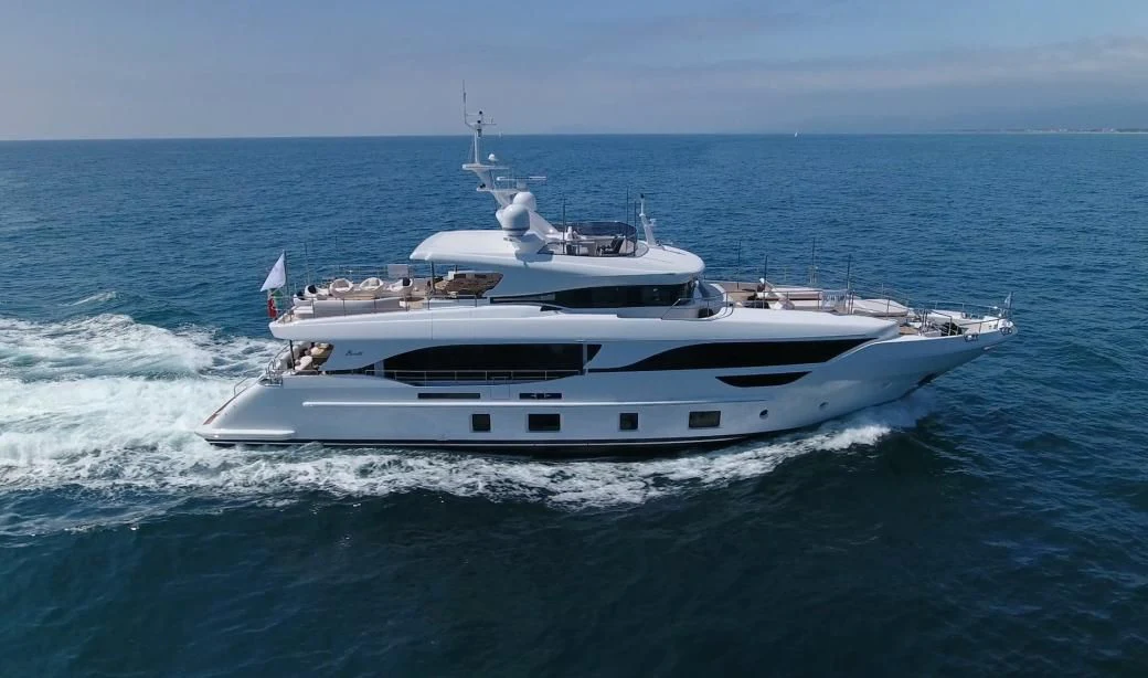 a white yacht in the ocean aboard PORTOVINO Yacht for Sale