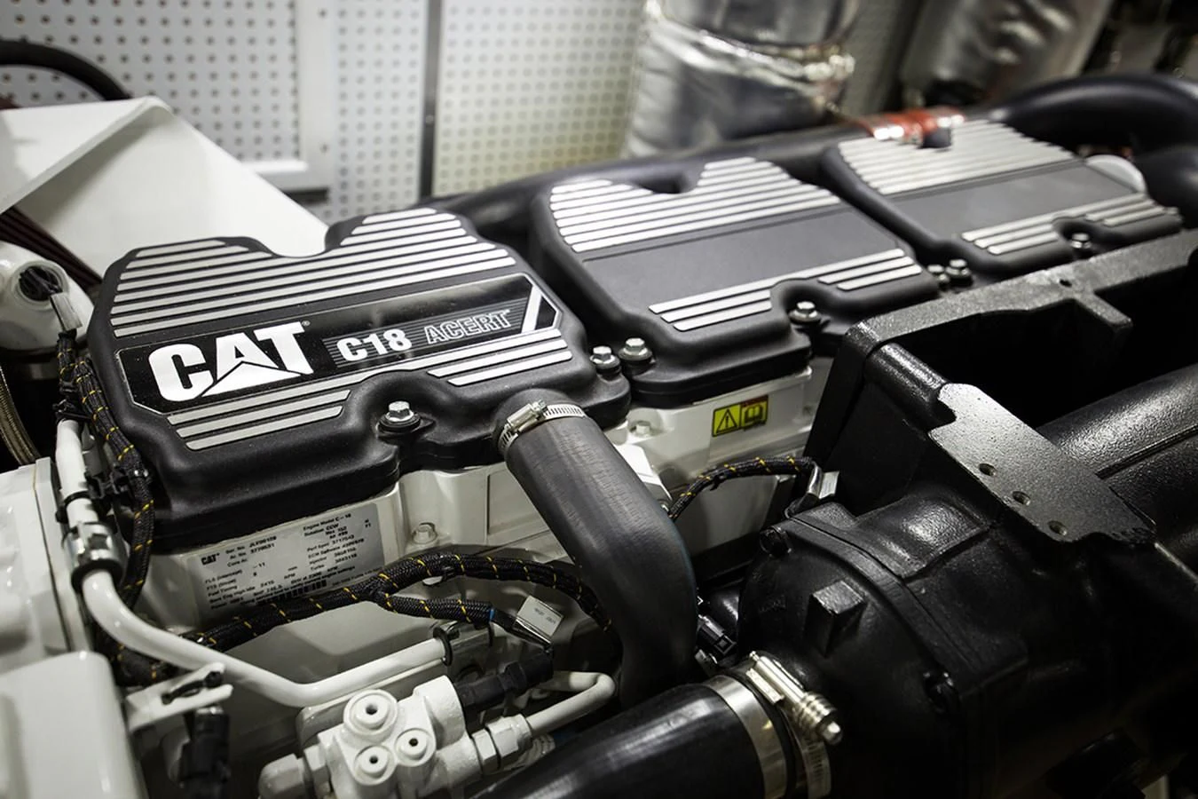 a black and white photo of a car engine aboard 44 NORTH Yacht for Sale