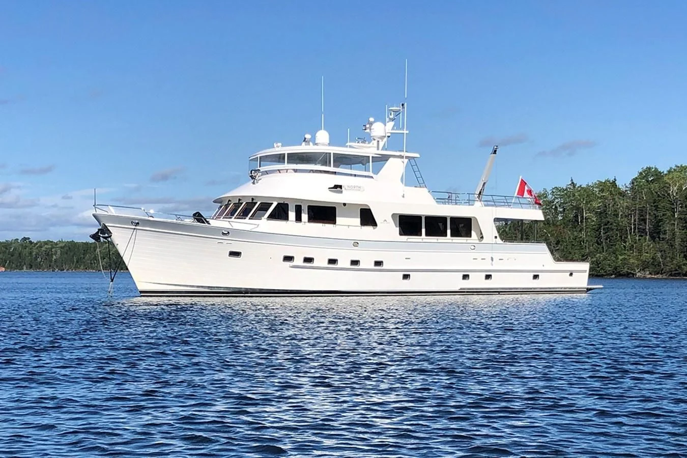 a large white boat in the water aboard 44 NORTH Yacht for Sale