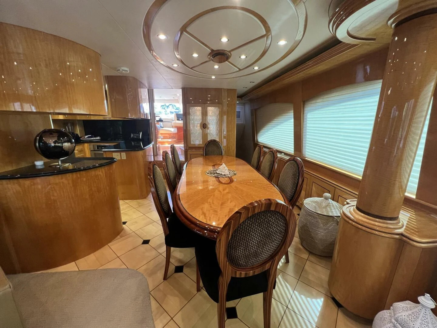 a dining table in a room aboard ARETECTE Yacht for Sale