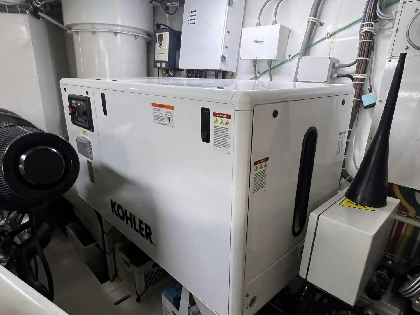 a machine with a large white object on the side aboard ARETECTE Yacht for Sale