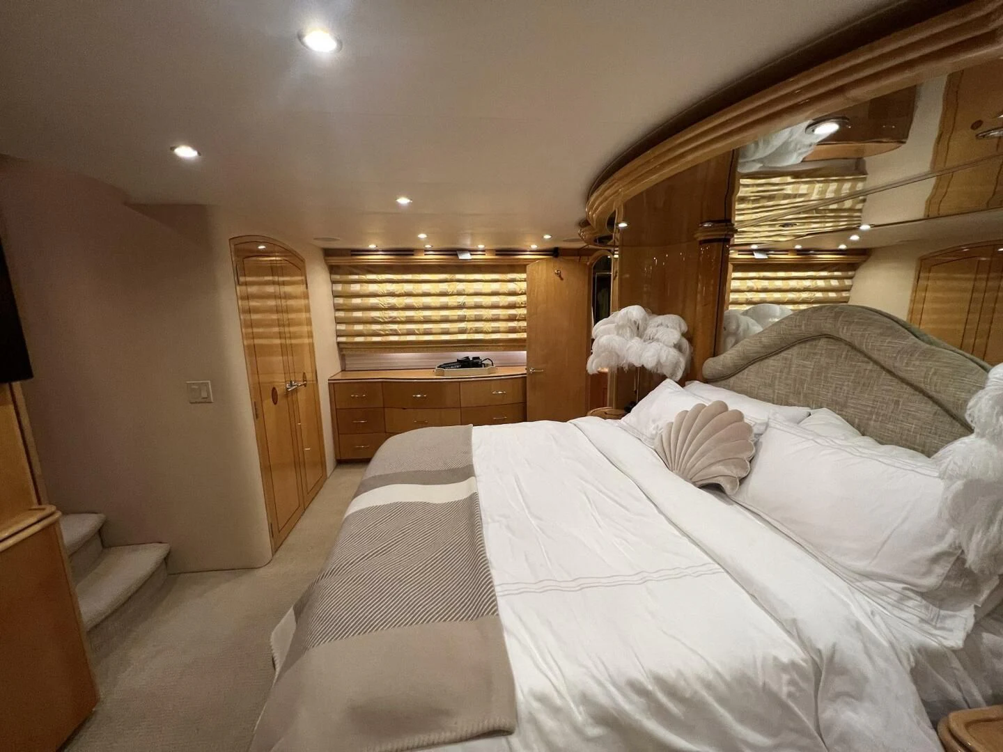 a bed with white sheets aboard ARETECTE Yacht for Sale